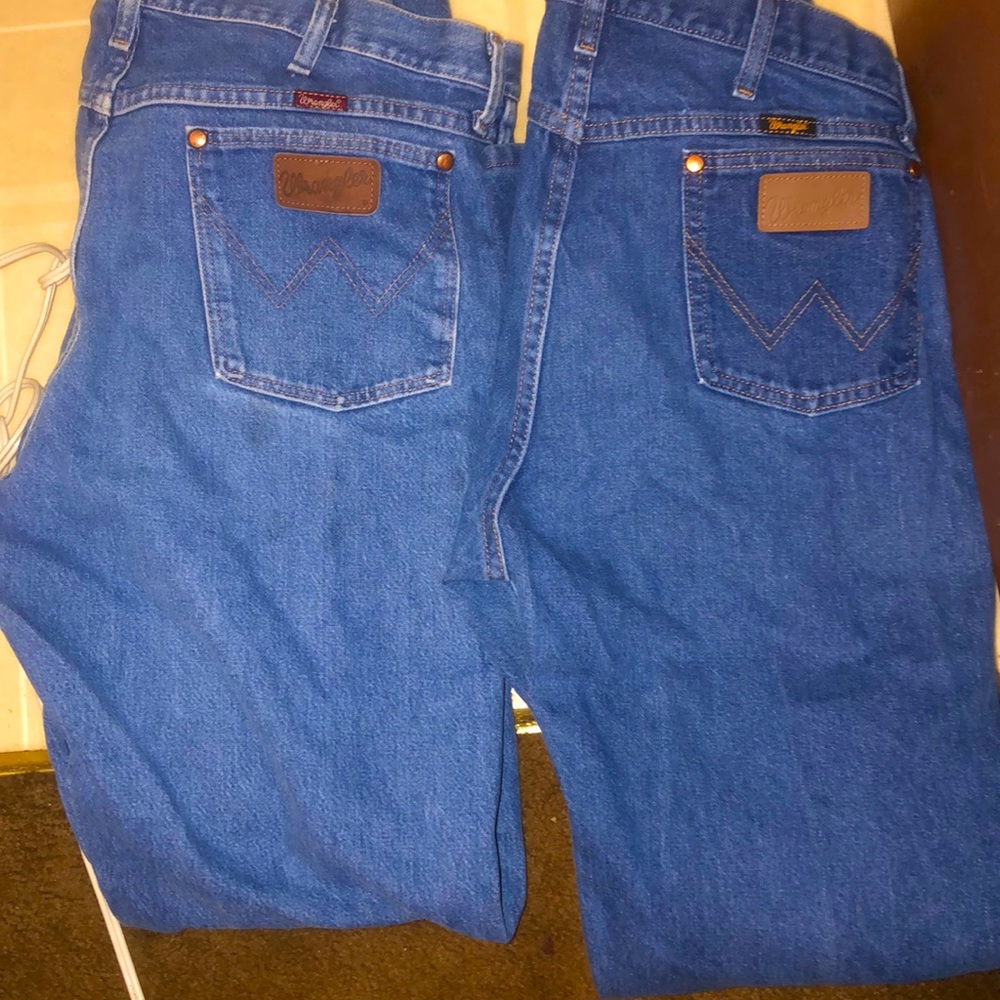 Two pairs of wranglers size 36 34